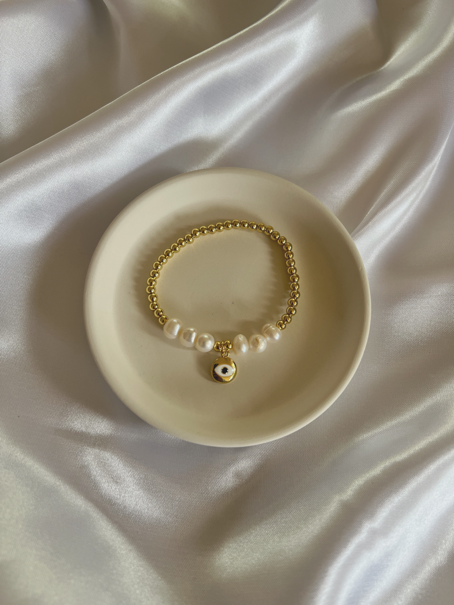 Pearl and Gold Mal de Ojo