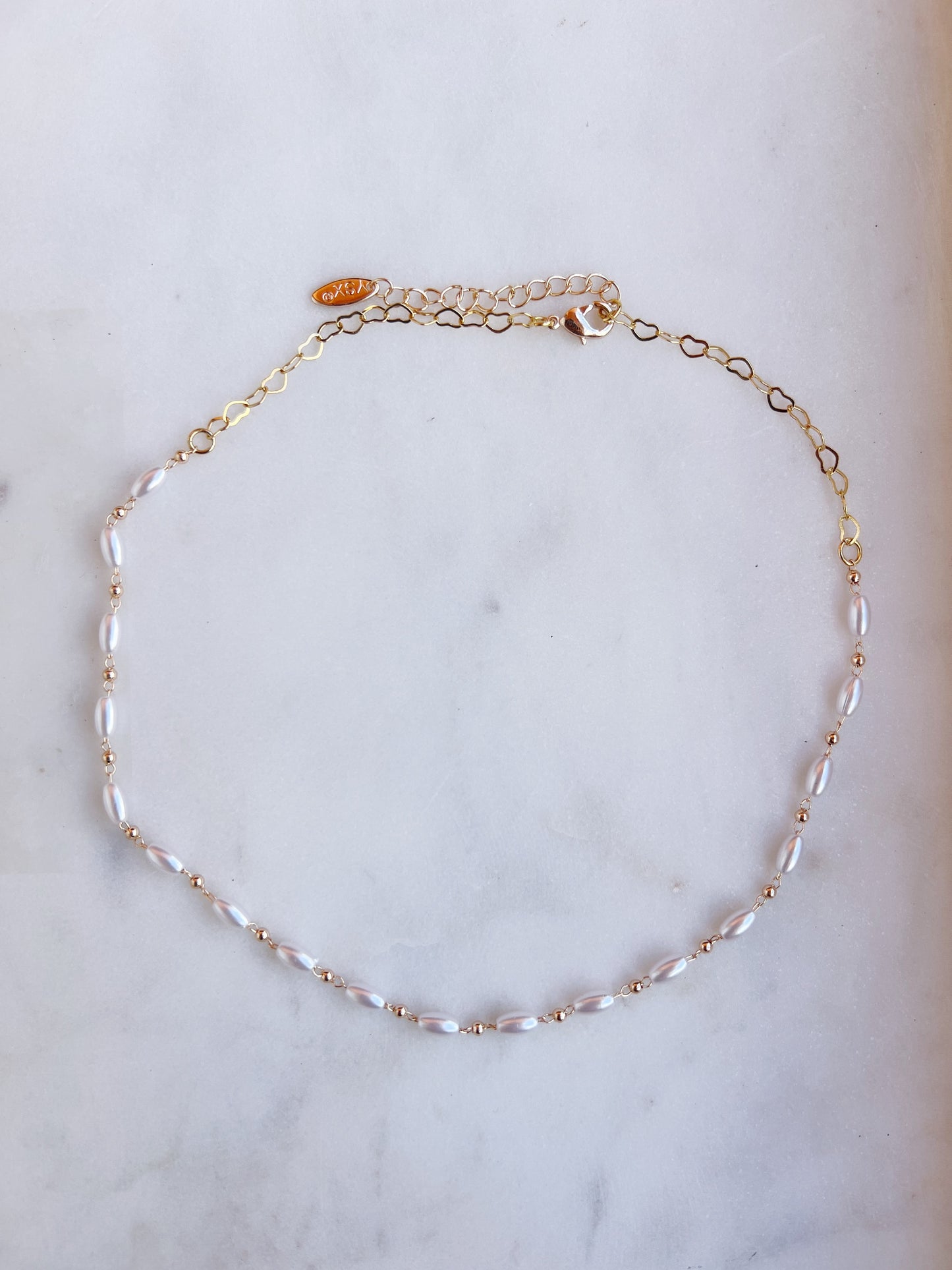 The Gold Pearl Necklace