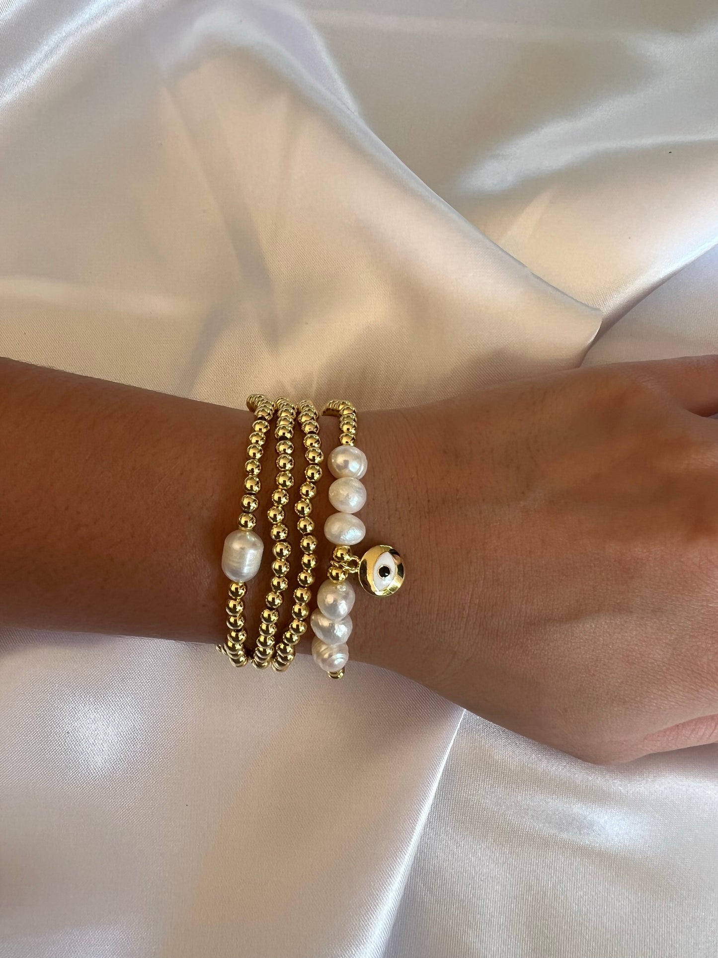 Pearl and Gold Mal de Ojo