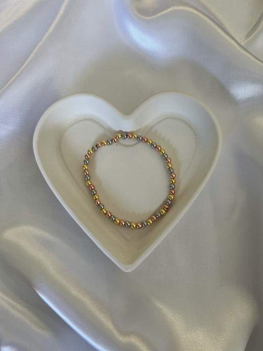 White Gold, Rose Gold, and Gold Beads Bracelet